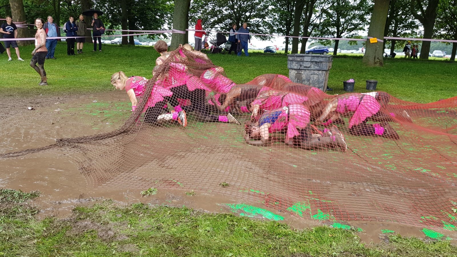 the girls crawling under net